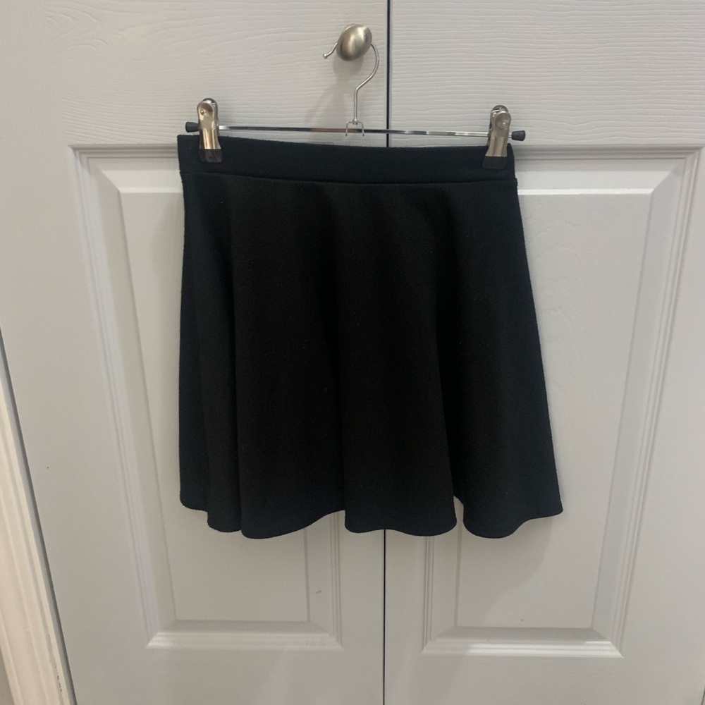 ABOUND brand skater skirt. 86% polyester.